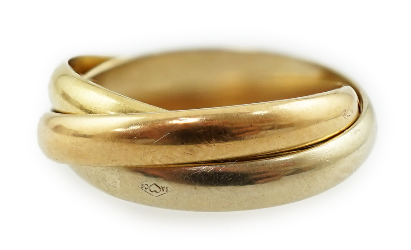 A modern French Cartier three colour 18k gold 'Russian' wedding ring